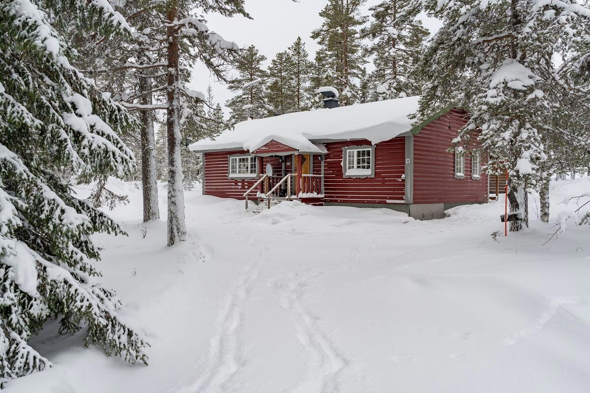 A Gray Swedish Log House Decorated for Christmas 20 red swedish cottage in winter landscape nordroom