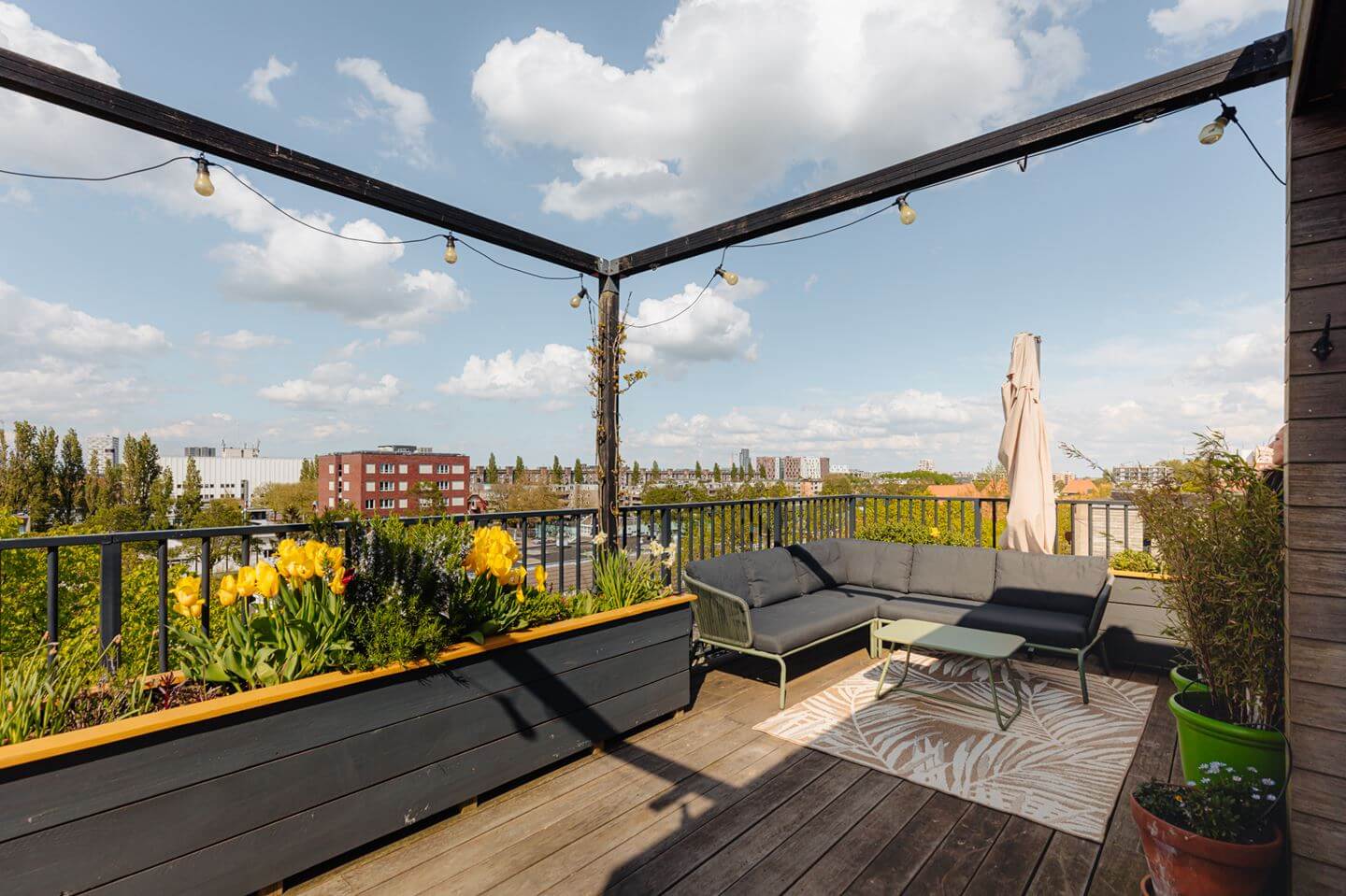A Modern Loft-Style School Conversion in Amsterdam 26 roof terrace school conversion amsterdam