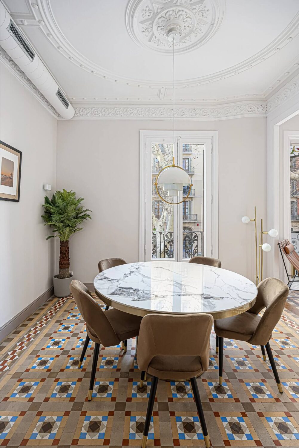 A Renovated Modernist Apartment in Barcelona 8 round dining table barcelona apartment nordroom