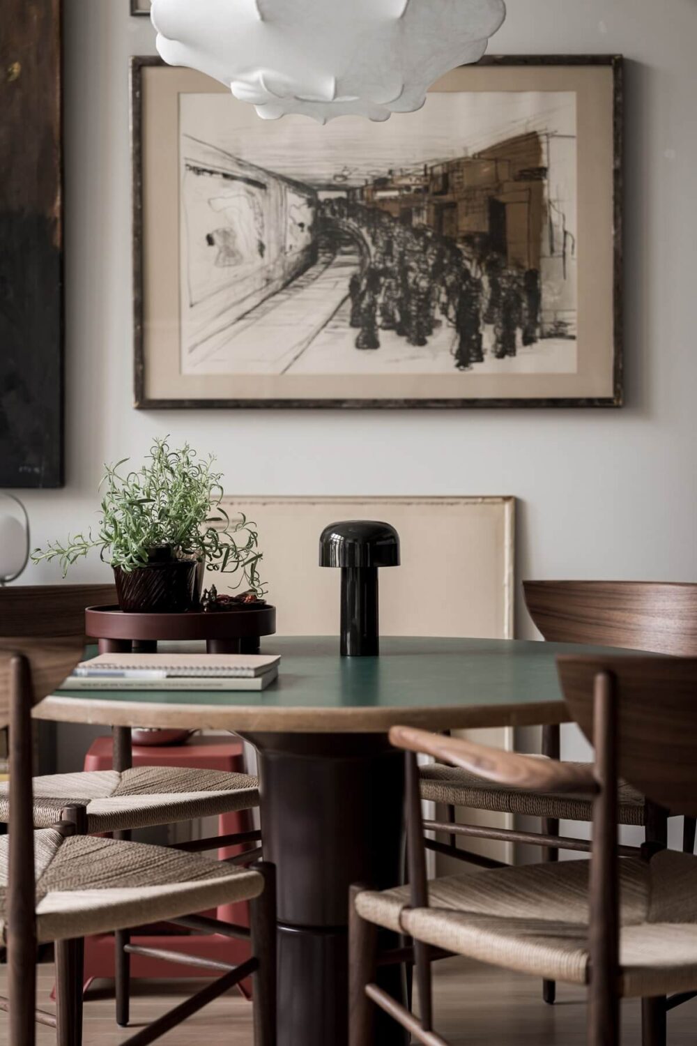 A Monochrome Loft with High Ceilings and Art 19 round kitchen table