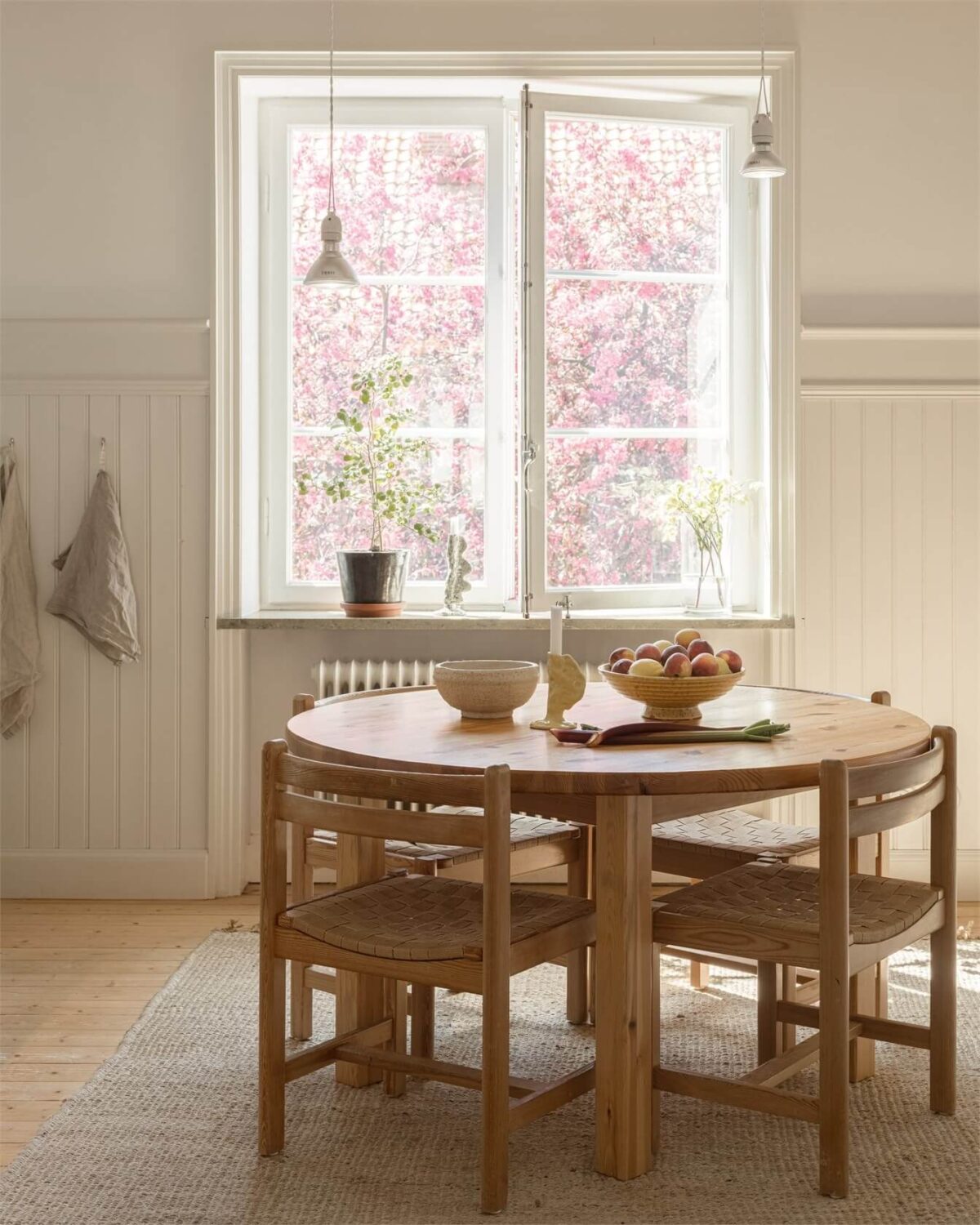 Wooden Details in a Light Duplex Apartment in Sweden 7 round wooden kitchen table