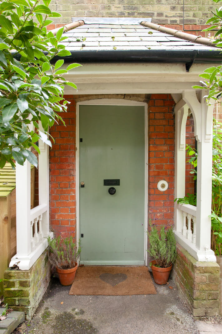 Charming Cottage Style in a London Maisonette 20 sage green font door nordroom