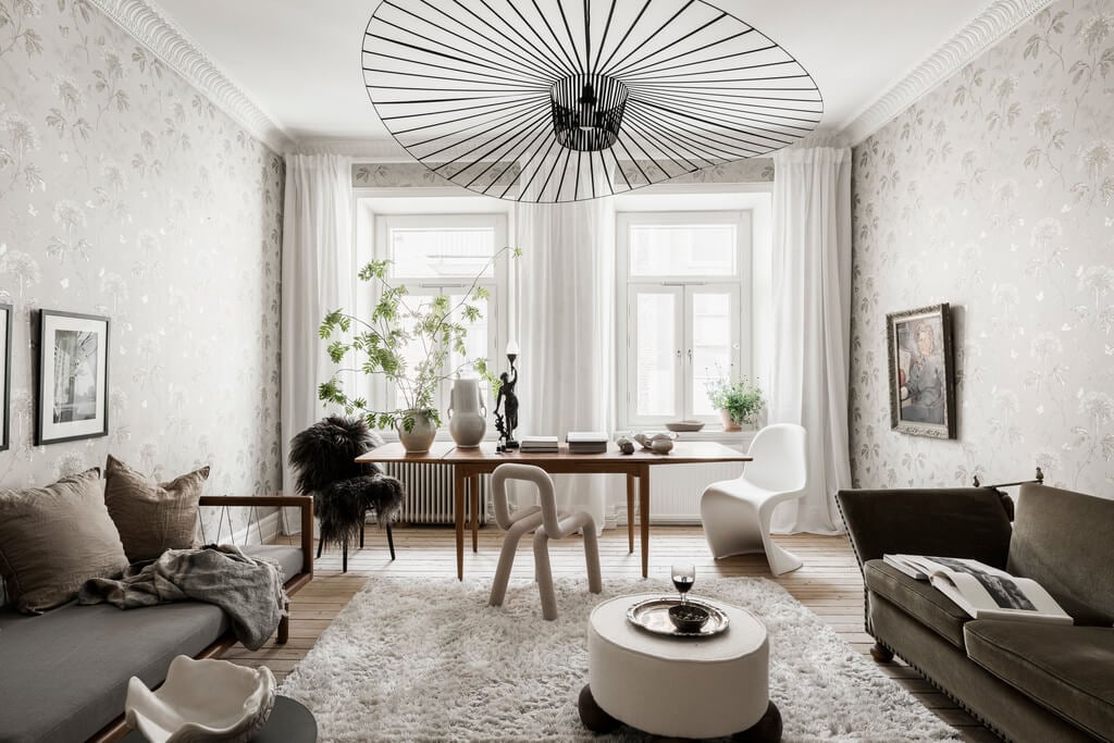 Wallpaper and Historic Charm in a Swedish Apartment 3 scandi living room dining table
