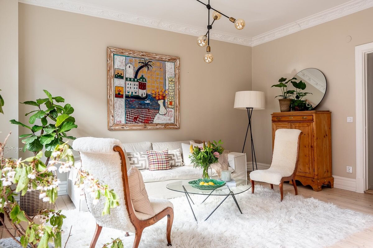 A Turn of the Century Apartment with a Green Kitchen 3 scandi living room with beige walls