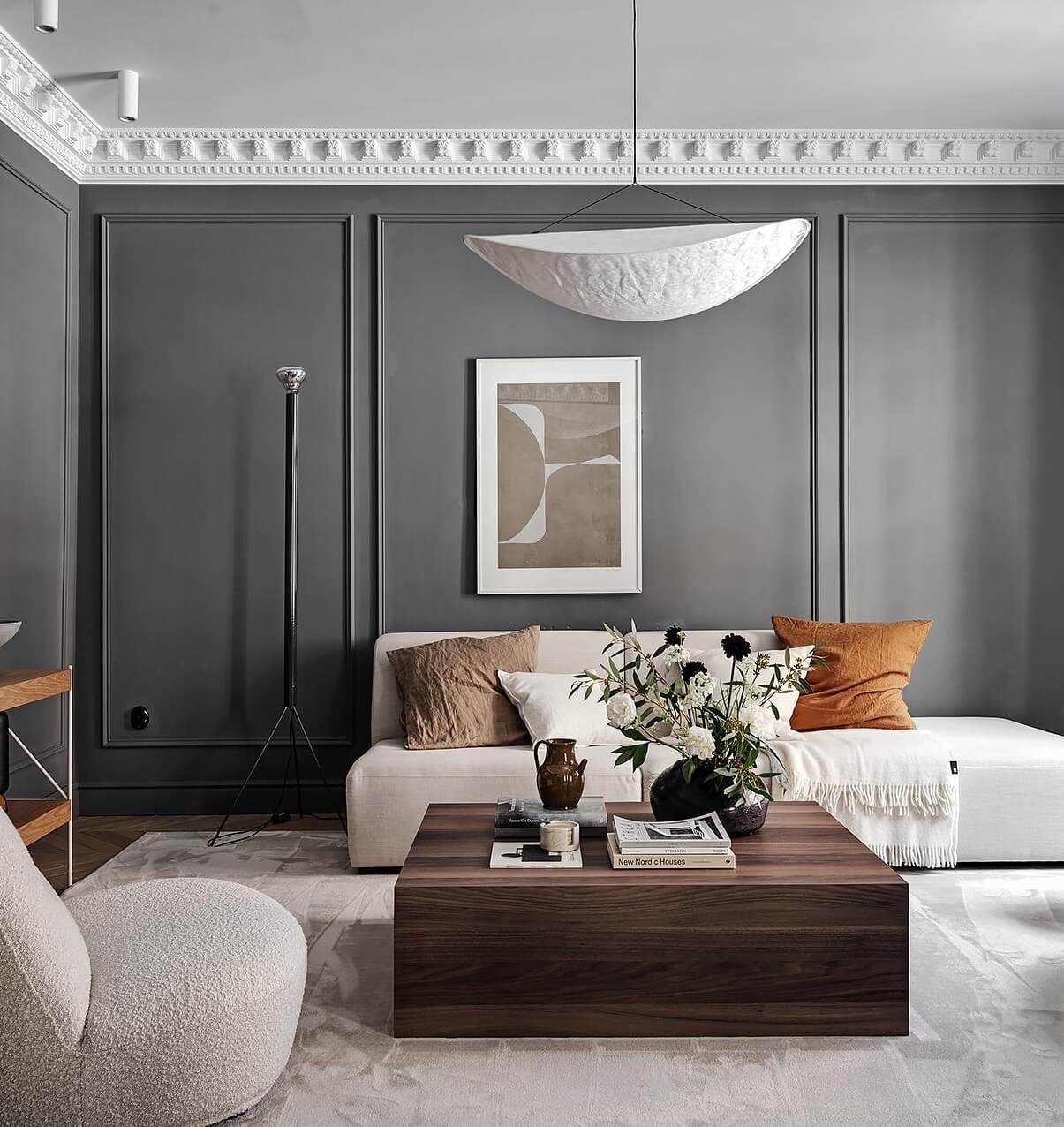 A Luxurious Renovated Apartment with Dark Gray Walls 2 scandi living room with gray walls