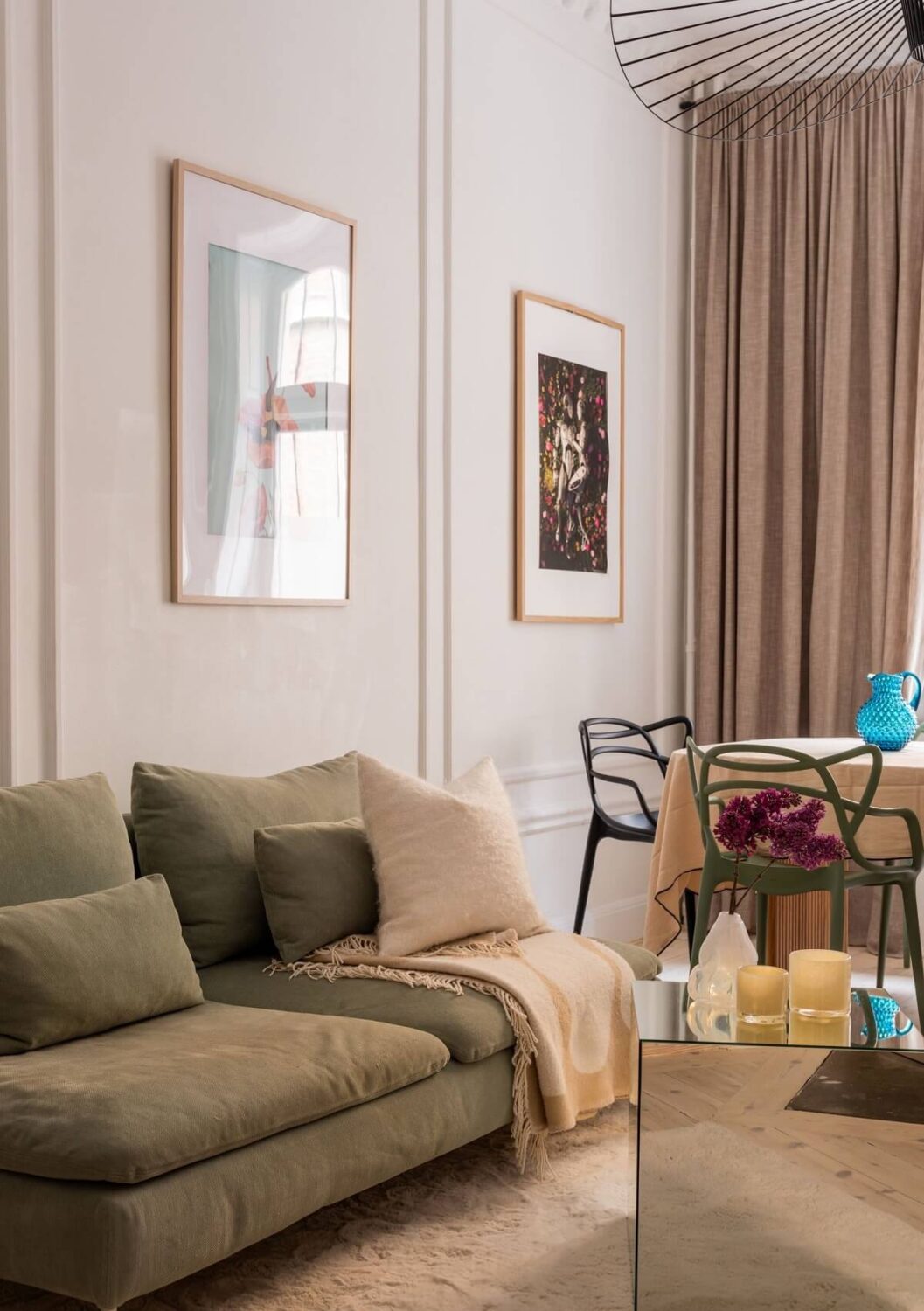 A Small, Tastefully Renovated Apartment in Stockholm 2 scandi living room with green sofa
