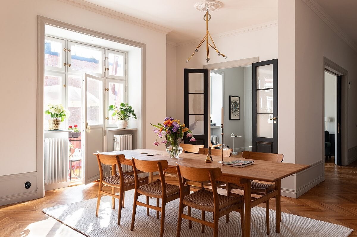 An Elegant Turn-of-the-Century Apartment in Stockholm 8 scandinavian dining room
