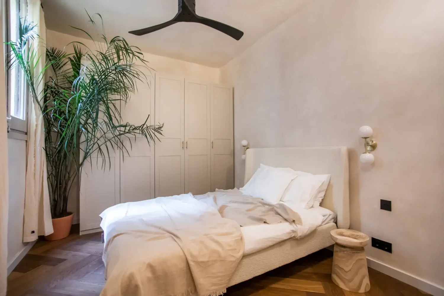 A Serene Apartment in Barcelona's Gothic Quarter 7 serene bedroom with wooden floor and built in warrobes