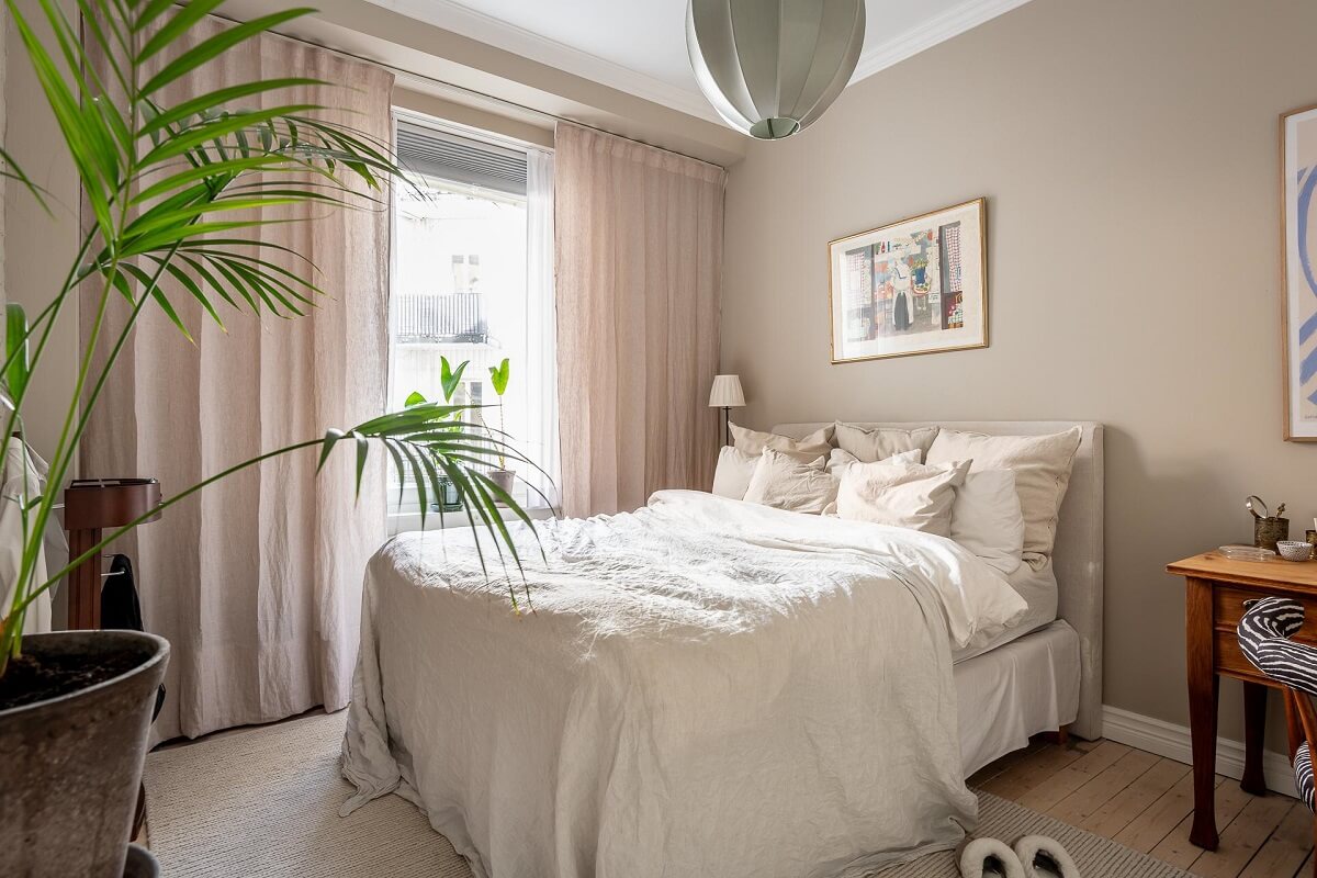 A Turn of the Century Apartment with a Green Kitchen 15 serene bedroom