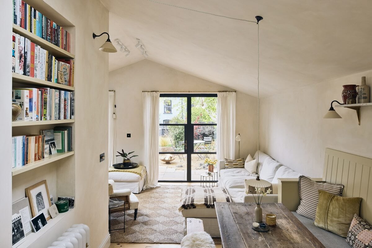 serene living room with pitched ceiling