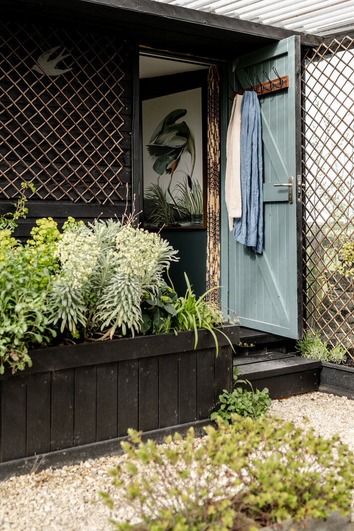 A Tiny Off-Grid House in the English Countryside 13 shed-entrance