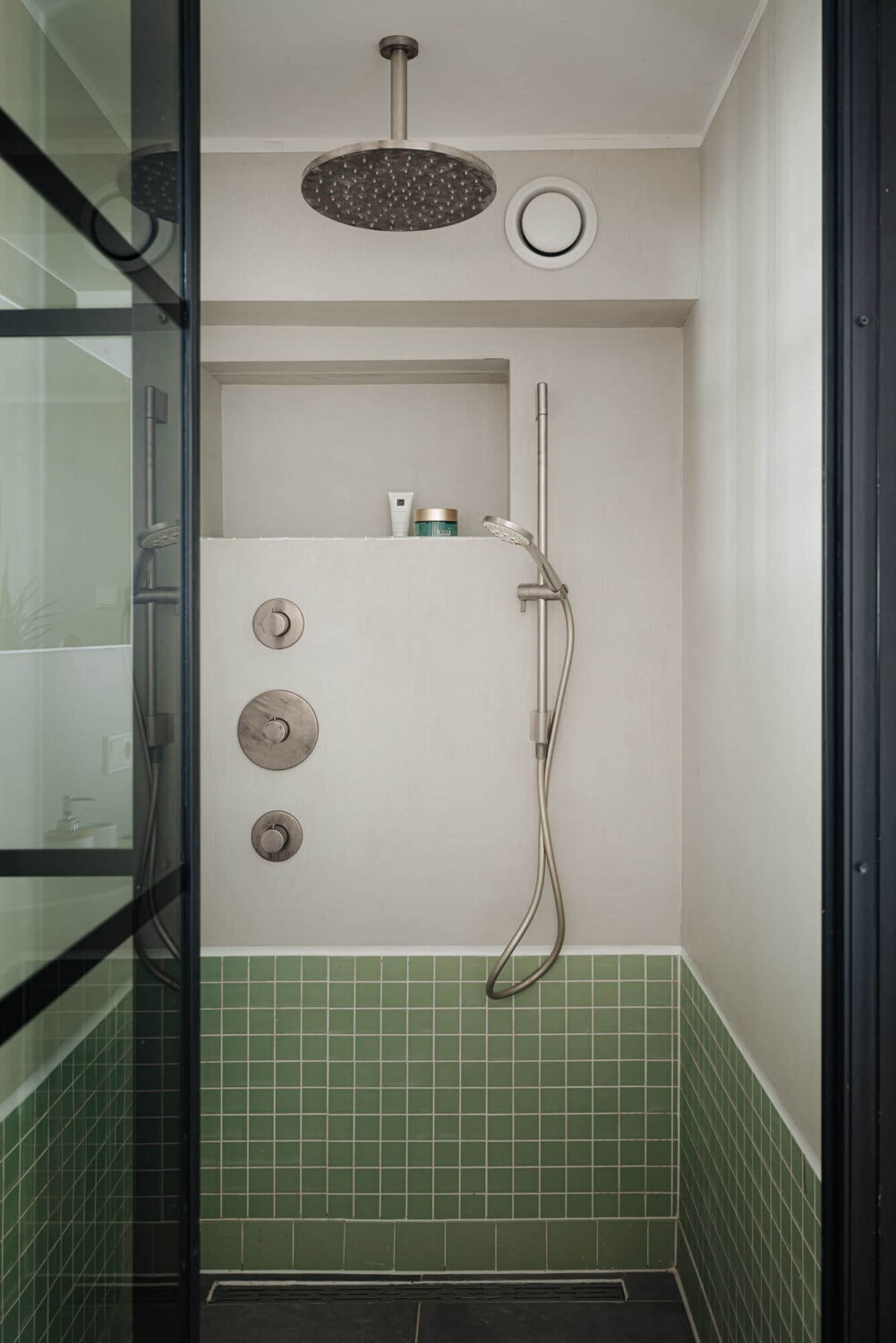 A Modern Loft-Style School Conversion in Amsterdam 23 shower green tiles