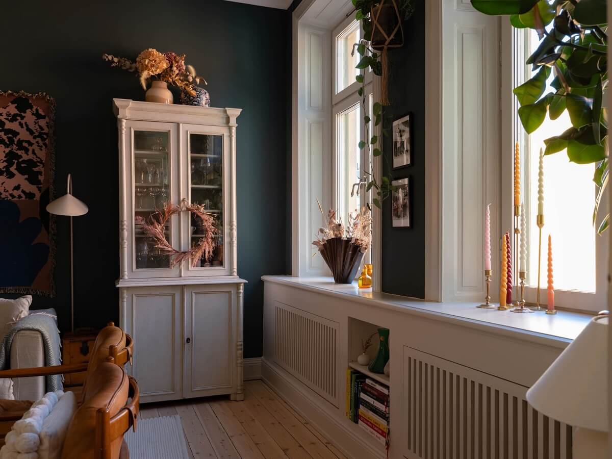 Light and Dark Tones in a Stunning Apartment 5 sitting room dark blue walls