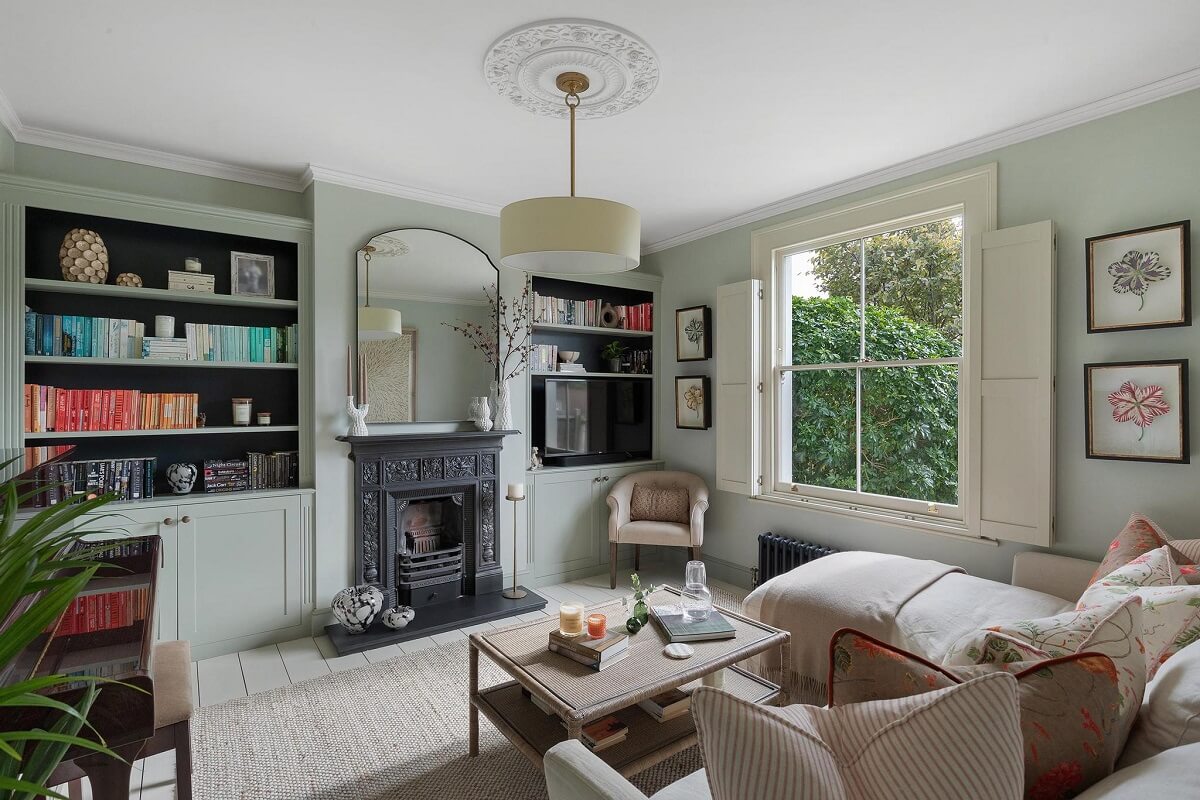 A Victorian House with a Blue deVOL Kitchen 8 sitting room with built in bookshelves