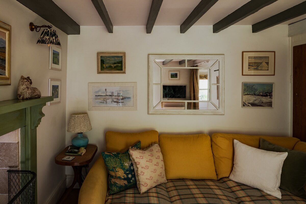 Ochre Yellow and Green Tones in a Cozy Welsh Cottage 7 sitting room yellow sofa