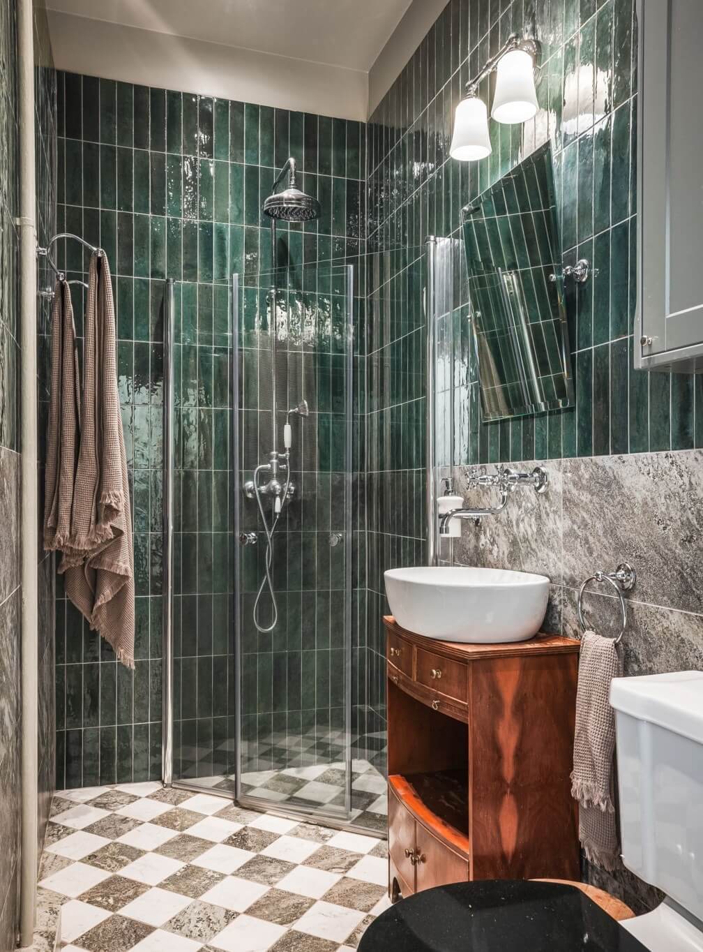 Warm Color Tones in a Scandinavian Apartment 11 small bathroom with green tiles and checkerboard floor nordroom
