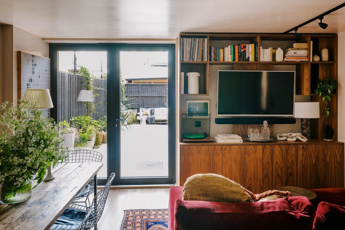 Warm Color Tones in a London Apartment with a Garden 6 small living room with custom wooden cabinet