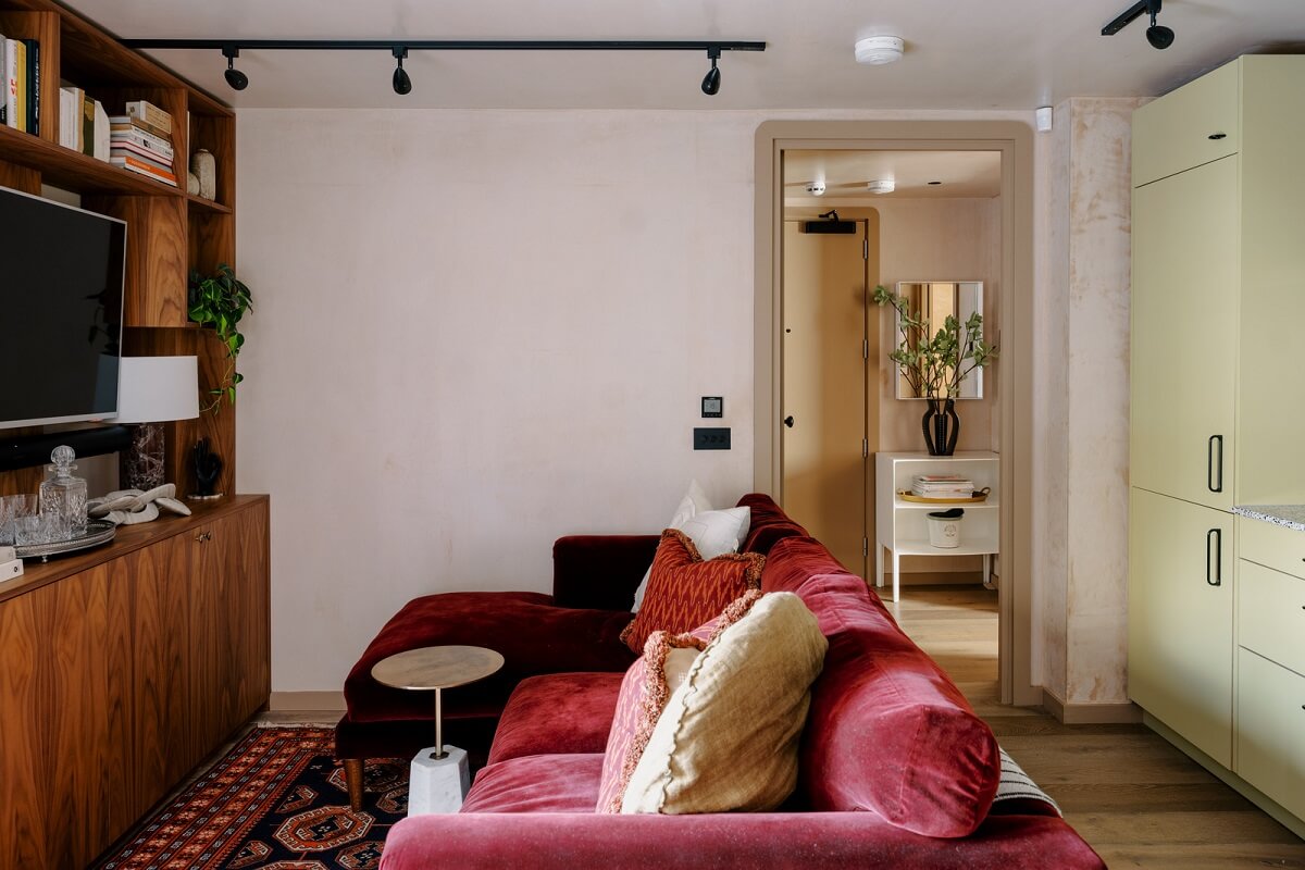 Warm Color Tones in a London Apartment with a Garden 7 small living room with pink sofa