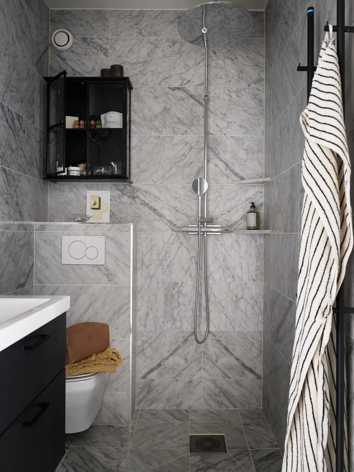 A Stunning Bathroom in a Duplex Apartment in Stockholm 16 small marble bathroom