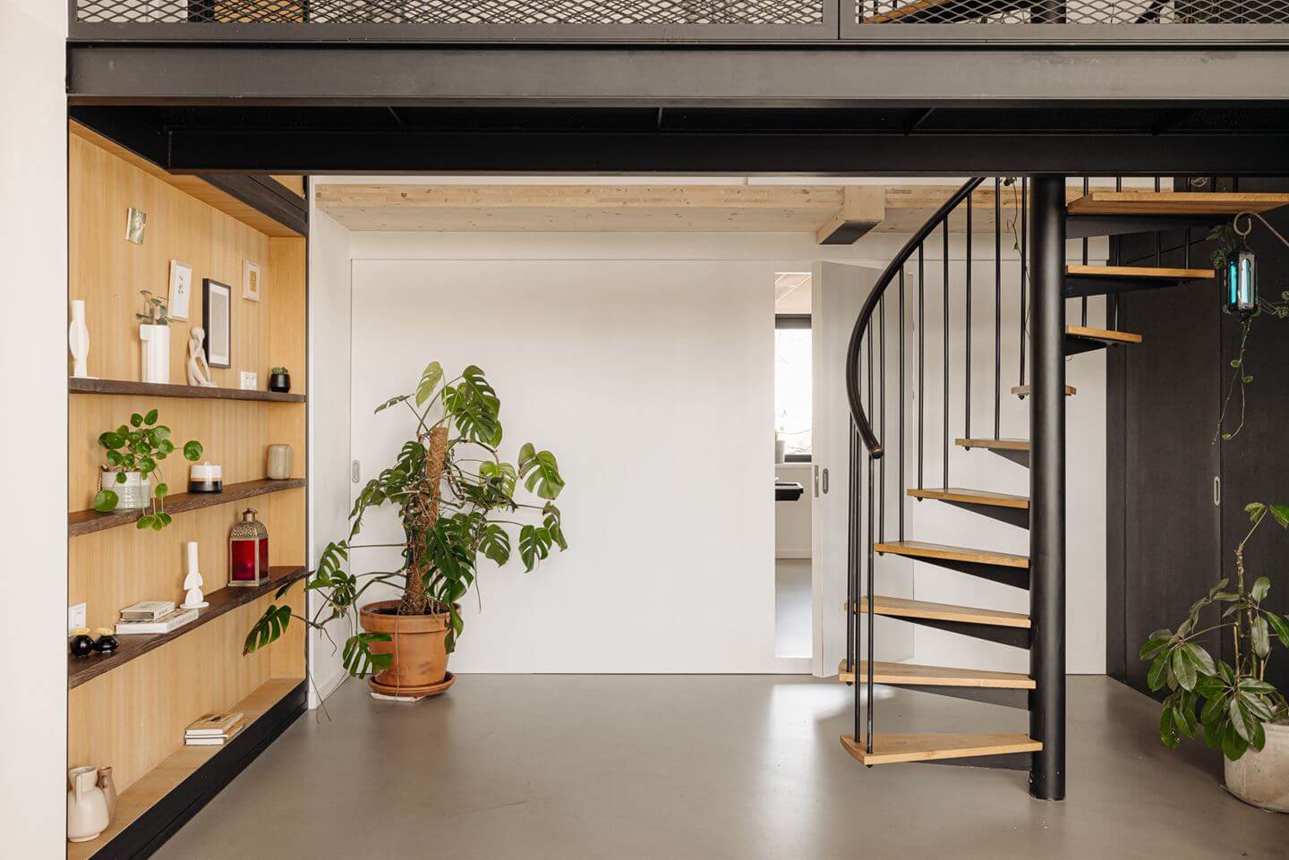 A Modern Loft-Style School Conversion in Amsterdam 14 spiral staircase