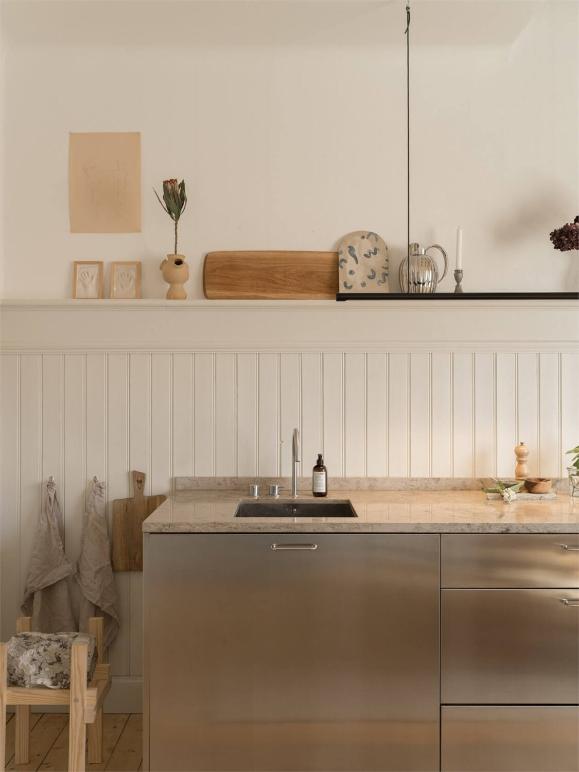 Wooden Details in a Light Duplex Apartment in Sweden 5 stainless steel kitchen (2)