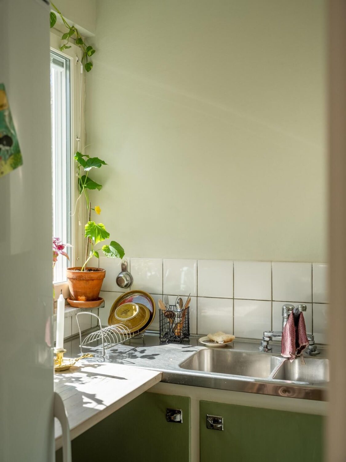 A Studio Apartment with Vintage Green Cabinets 12 studio kitchen