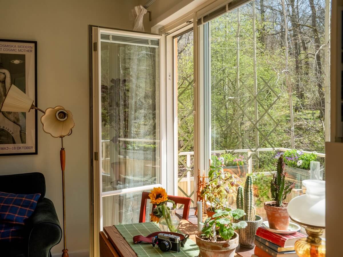 A Studio Apartment with Vintage Green Cabinets 8 studio with balcony