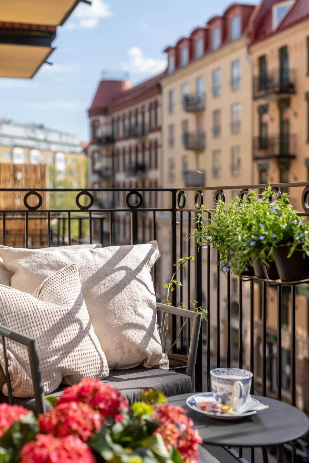 A Turn of the Century Apartment with a Green Kitchen 14 sunny balcony