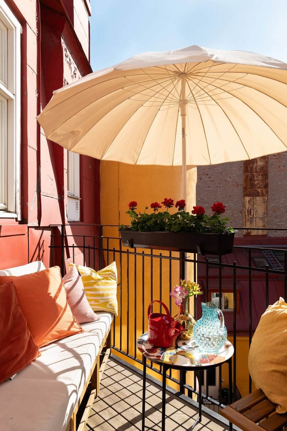 An Elegant Turn-of-the-Century Apartment in Stockholm 10 sunny balcony with parasol nordroom