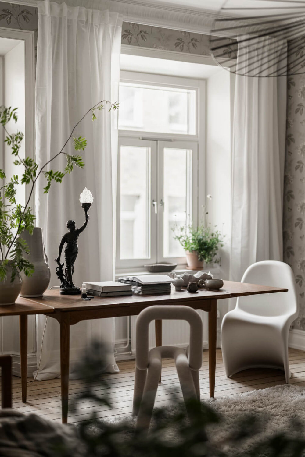 Wallpaper and Historic Charm in a Swedish Apartment 5 table
