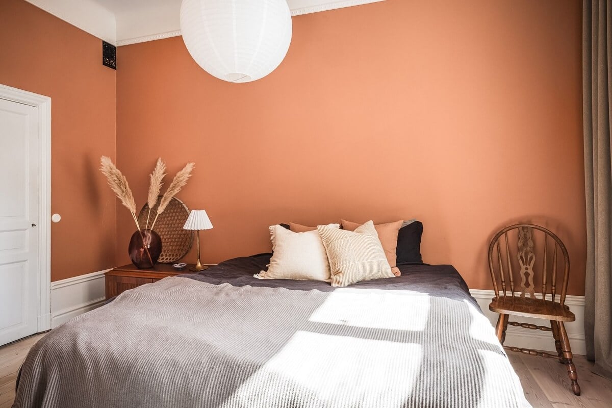 Warm Color Tones in a Scandinavian Apartment 10 terracotta walls bedroom