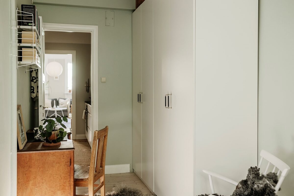 A Small Renovated 1920s Apartment in Stockholm 12 tiny bedroom with wardrobes