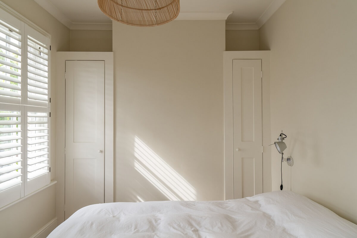 A Tiny Maisonette with Original Details in London 9 tiny light bedroom with built in wardrobes