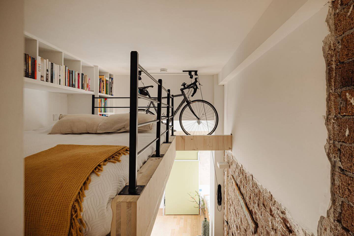 A Modern Loft-Style School Conversion in Amsterdam 11 tiny loft bedroom with shelves