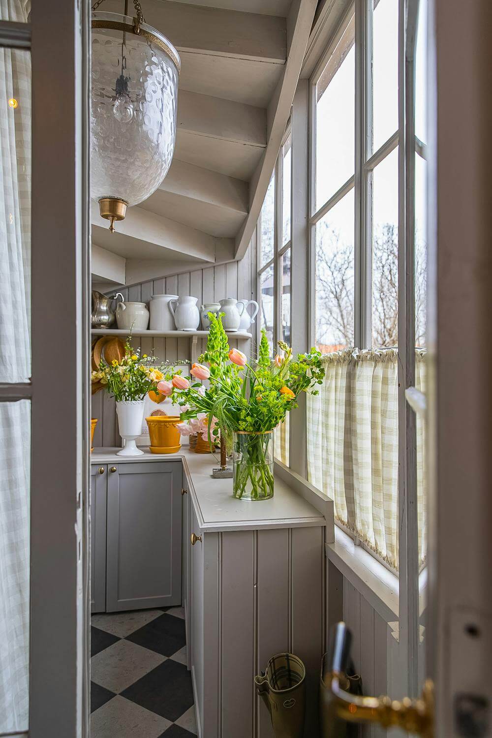 A Classic and Luxurious Lakeside Home in Sweden 5 utility room checkerboard floor luxurious summer house sweden nordroom