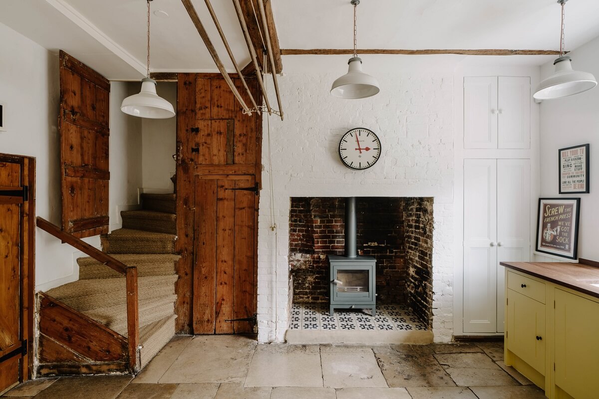 An 18th-Century Historic House with an Amazing Kitchen 9 utility room with yellow cupboards