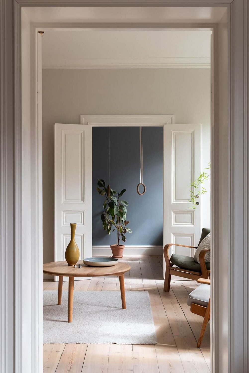 Light Rooms in a Renovated Historic Apartment in Stockholm 12 view into living room