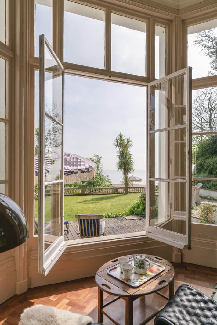 Grand Rooms and Vibrant Colors in an English Country Home 5 view of garden