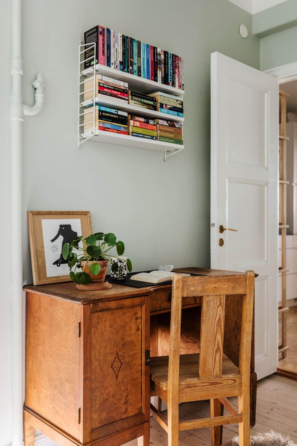 A Small Renovated 1920s Apartment in Stockholm 13 vintage desk in bedroom
