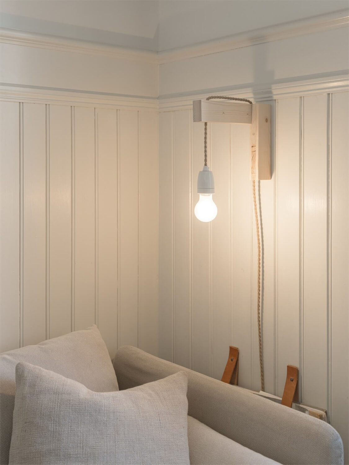 Wooden Details in a Light Duplex Apartment in Sweden 2 wall light detail