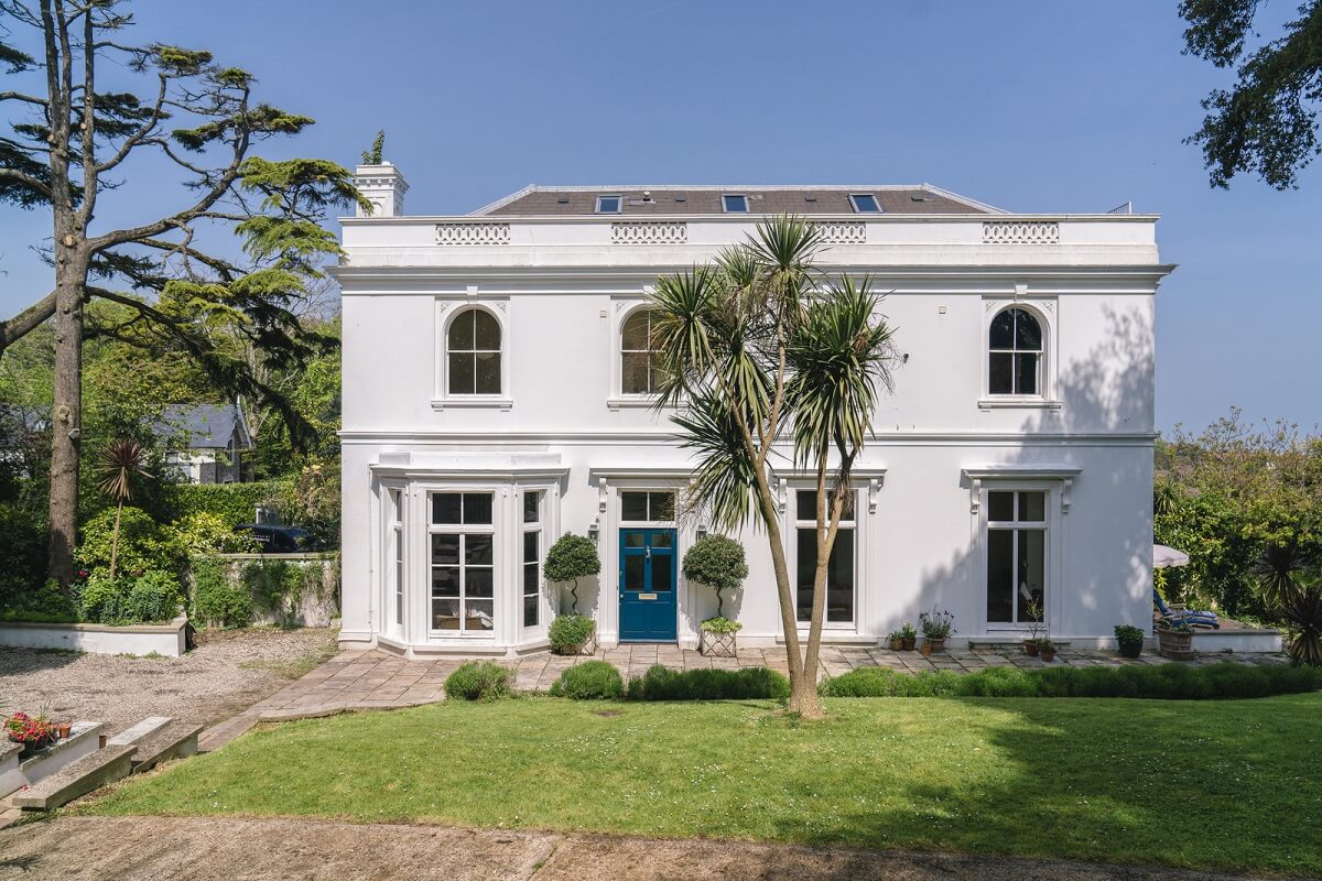 Grand Rooms and Vibrant Colors in an English Country Home 26 white house with green front door