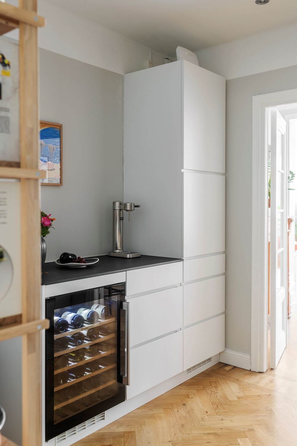 A Small Renovated 1920s Apartment in Stockholm 8 white kitchen