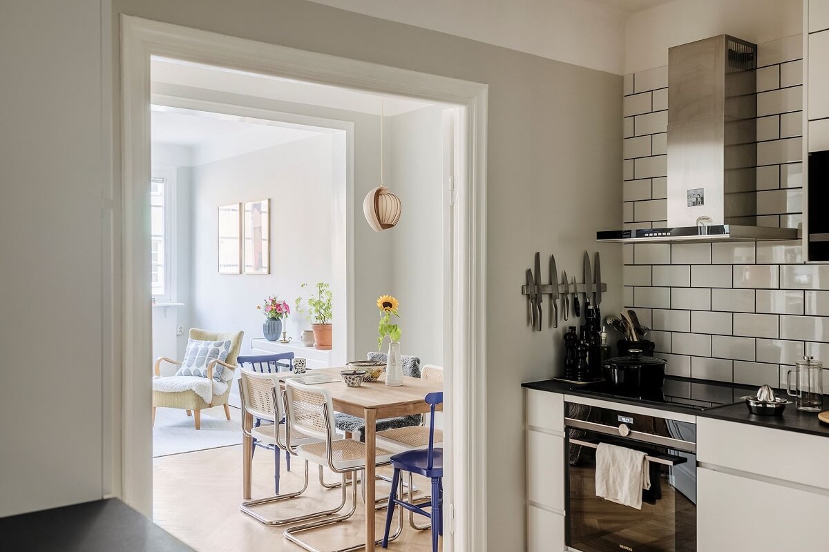 A Small Renovated 1920s Apartment in Stockholm 6 white subway tiles in minimalistic kitchen