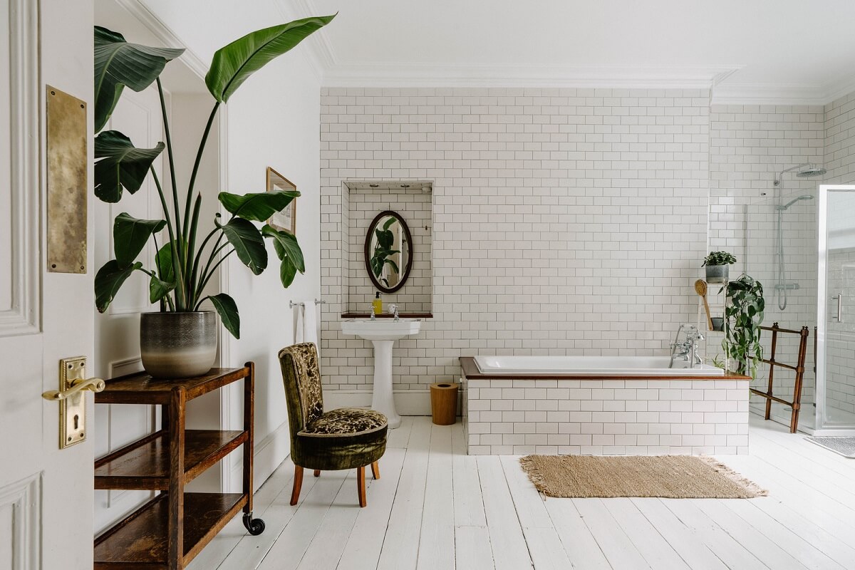 Neutral Tones and Original Features in an English Townhouse 13 white tiled bathroom