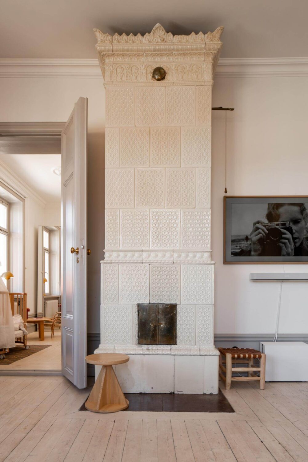 A Corner Apartment with an Industrial Style Kitchen 13 white tiled fireplace