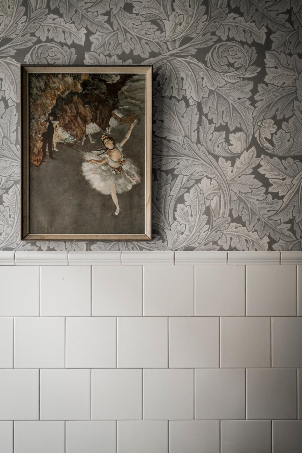 Wallpaper and Historic Charm in a Swedish Apartment 22 white tiles and wallpaper detail