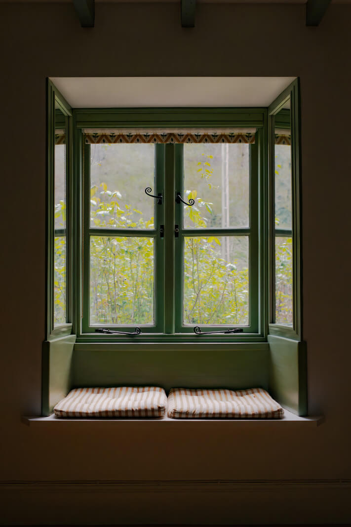 Ochre Yellow and Green Tones in a Cozy Welsh Cottage 8 window seat