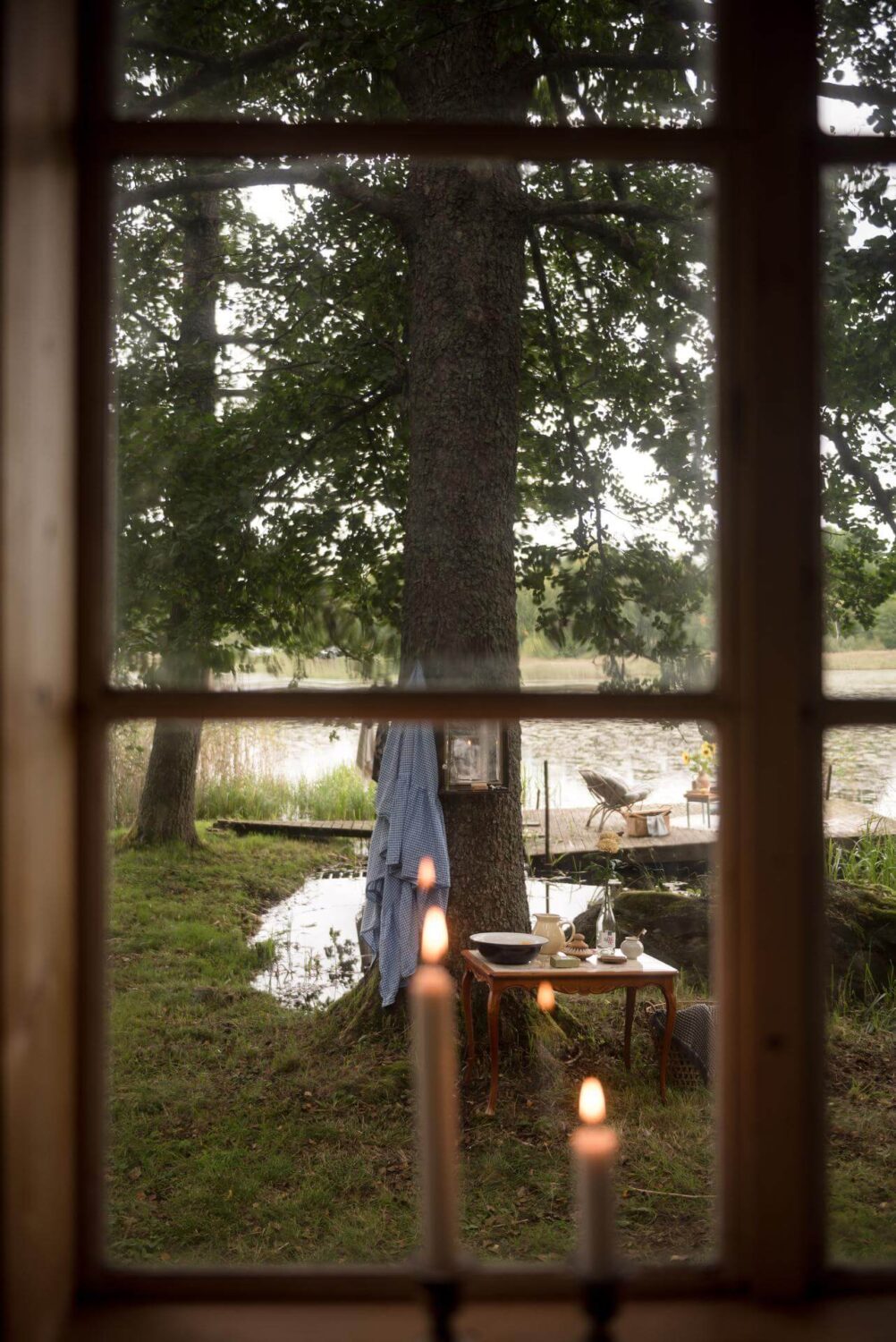 A Traditional Summer House Cabin in Sweden 5 window view traditional wooden summer cottage sweden nordroom