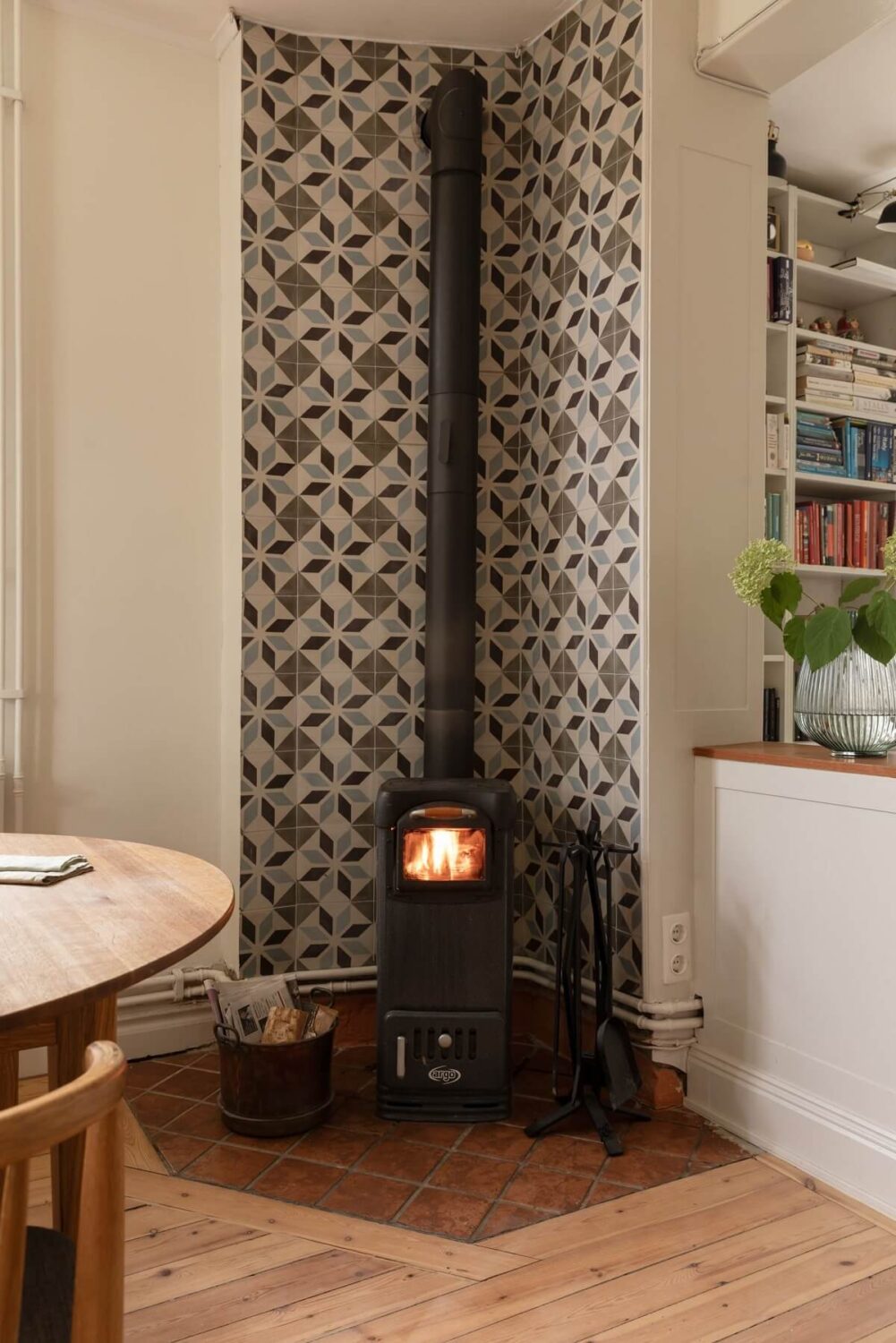 A Swedish Duplex with a Unique Wood and Pastel Colored Kitchen 7 wood burner