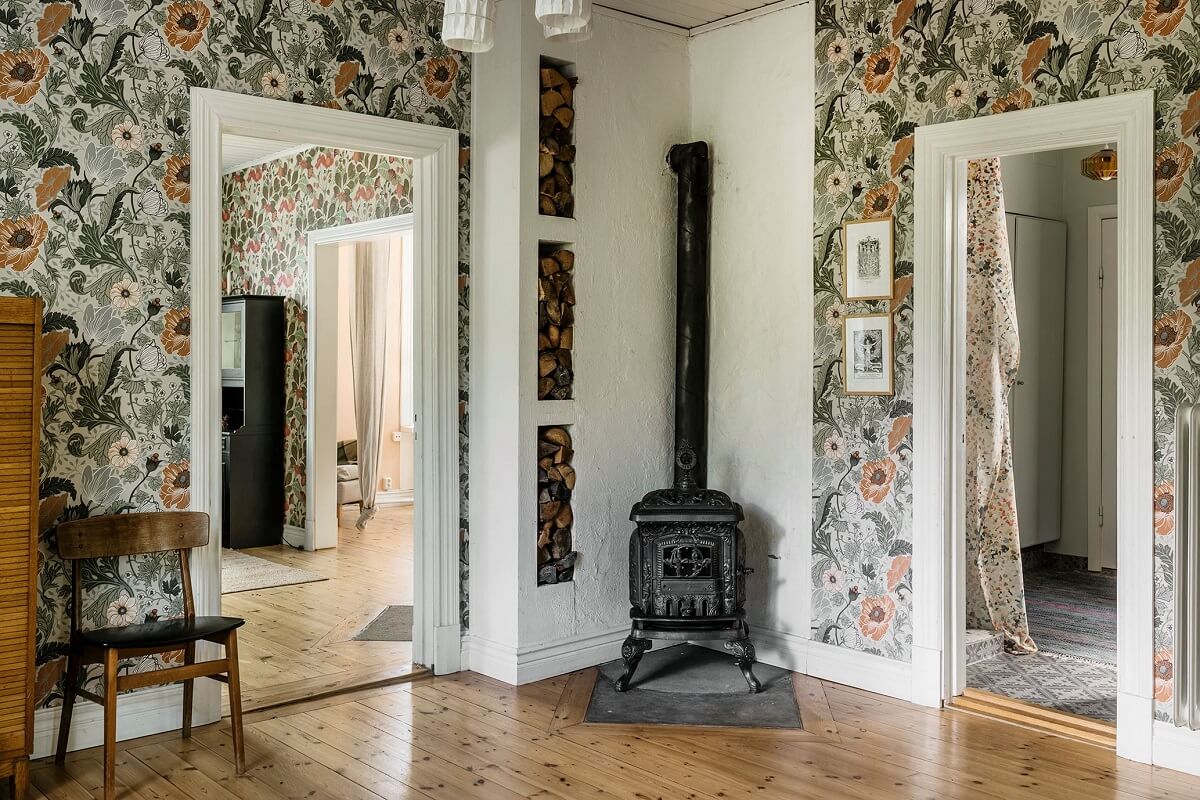 A Historic Swedish Country House with a Beautiful Garden 9 wood burner and wallpaper